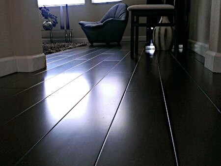 This is a picture of a dark smooth matte hardwood floor